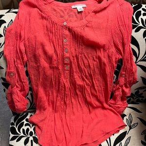 Blusa anaranjada para embarazadas